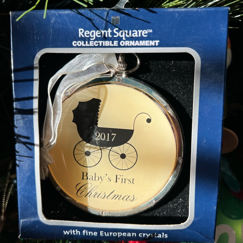 2017 Baby’s first Christmas ornament.  New in box. Regent square collectible.